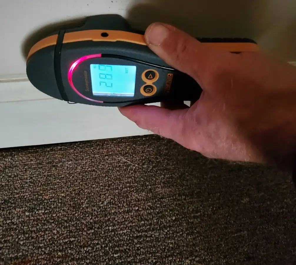 Moisture detection at baseboard during Sewage Cleanup & Sanitation in Stonecrest